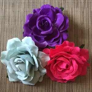 4 1/“ diameter, one rose, one purple, one pale green.